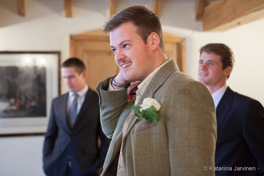 documentary wedding photography at Wethele Manor - usher wearing tweed